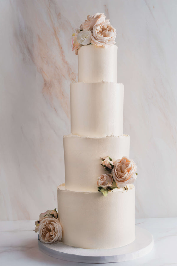 Classic butter cream cake with florals.