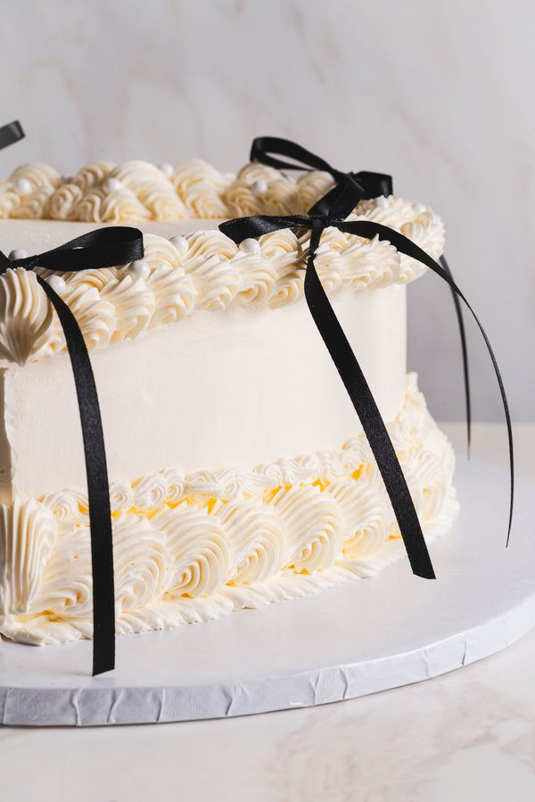 Heart Lambeth w/ bows cake.